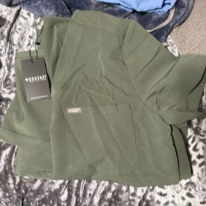 Code next joggers and one pocket scrub top